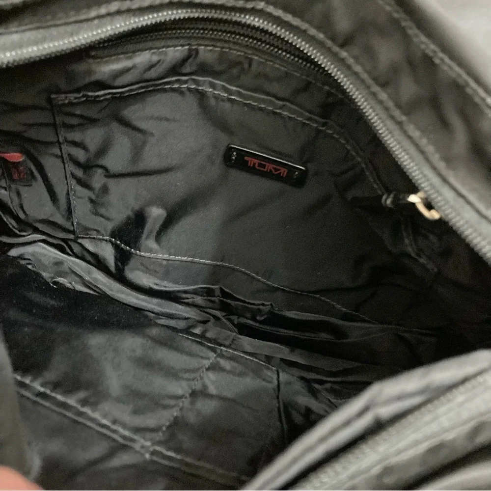 Tumi black nylon camera crossbody bag unisex
